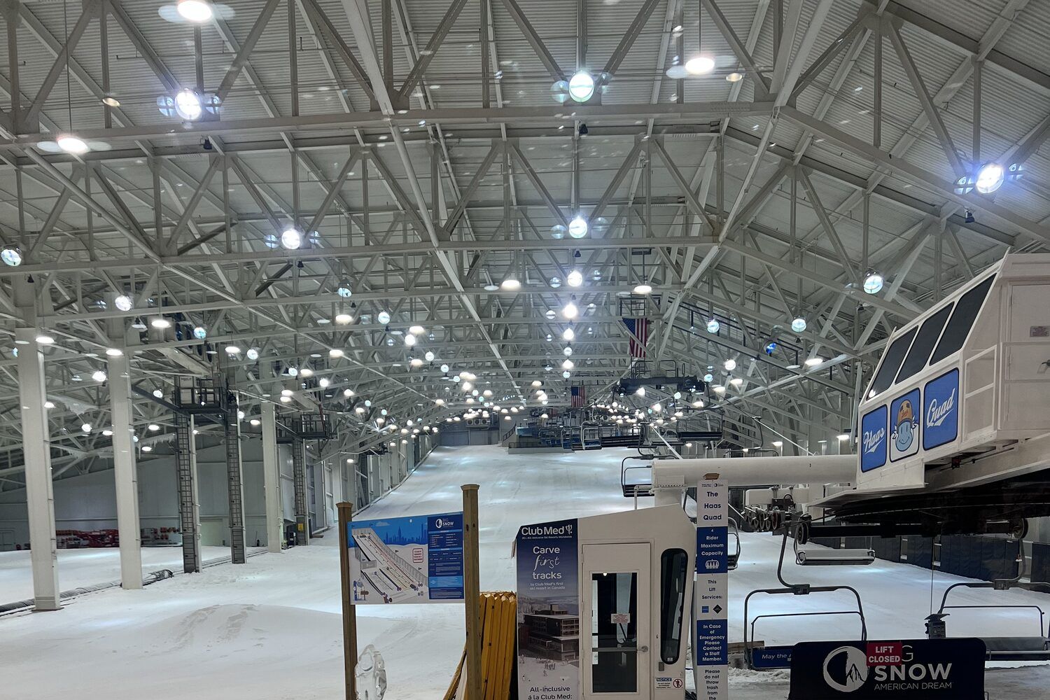 The empty indoor ski slope at Big SNOW, with a Lift Closed barrier in the foreground