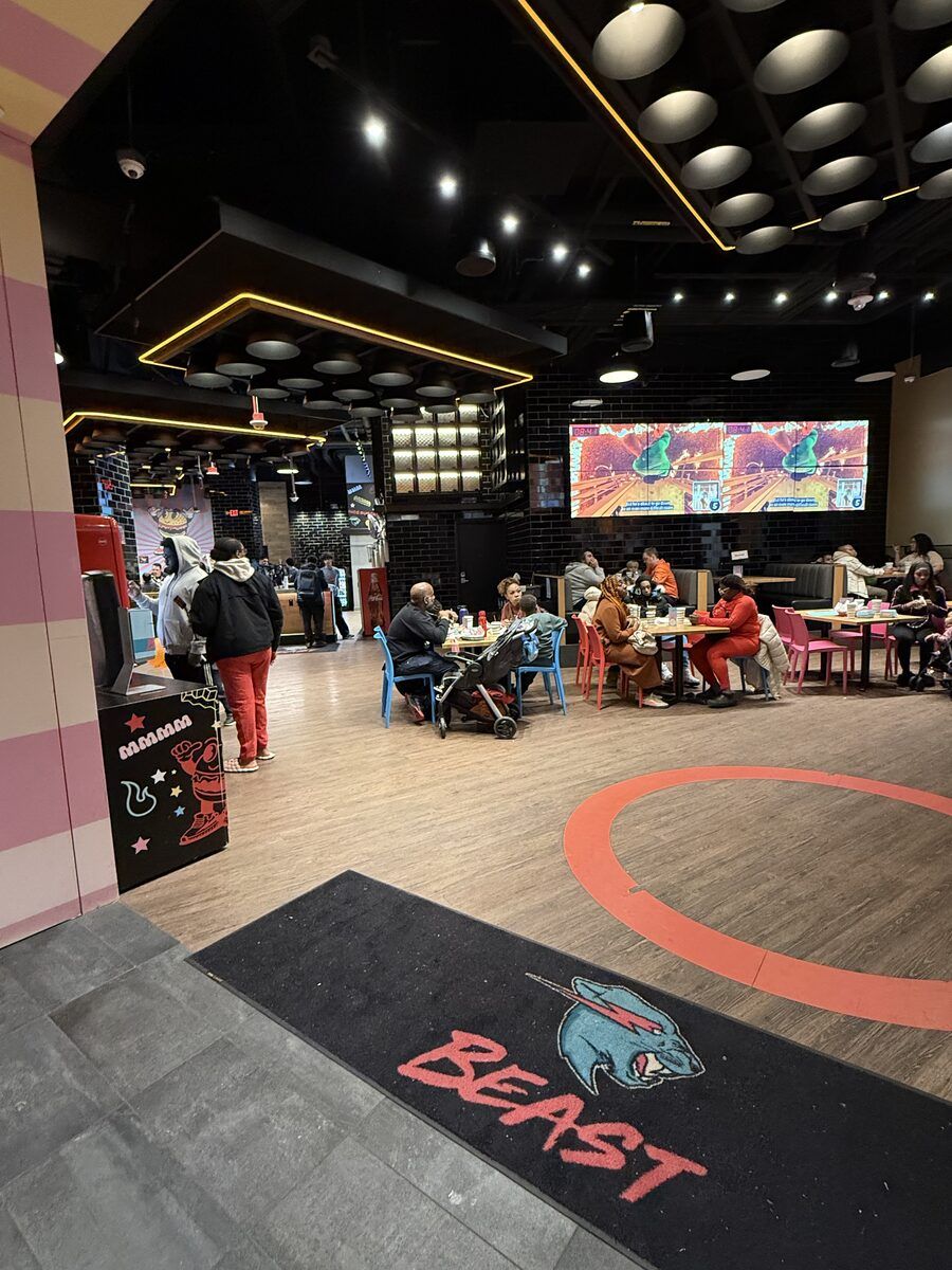 The interior of MrBeast Burger with arcade machines