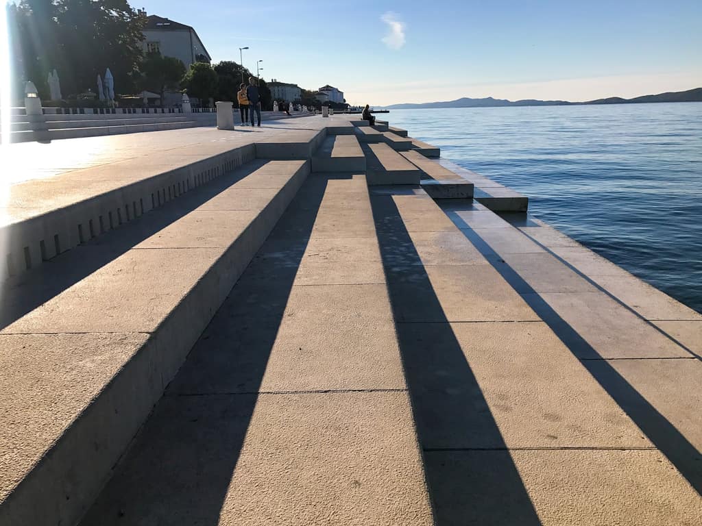 The wide stone steps of the Sea Organ running down into the sea