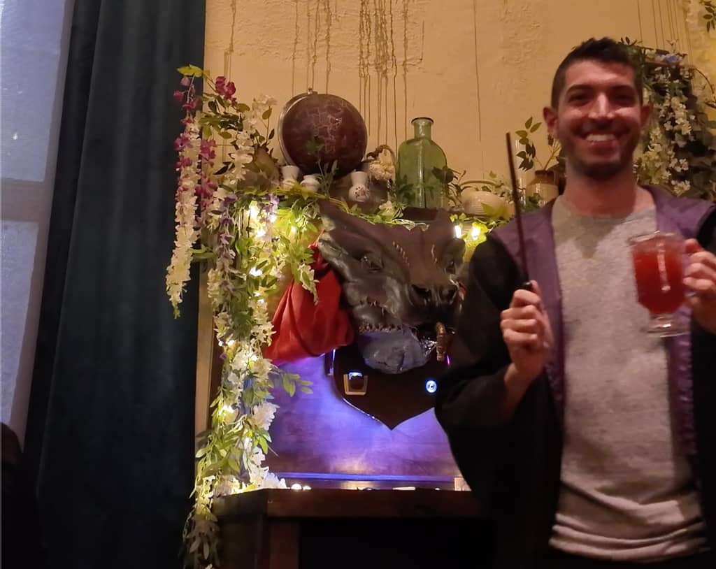 Rocky getting his drink from a dragon activated by a flick of a magic wand.