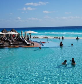 Enjoying This Resort’s Ocean-Blue Infinity Pool