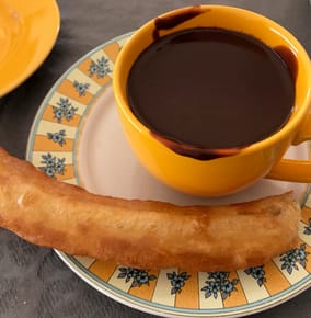 Dipping Churros in Chocolate at Chocolatería San Ginés