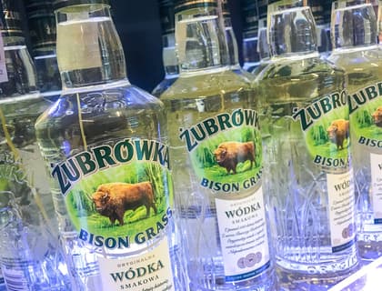 Bottles of Zubrowka bison grass vodka on a shelf