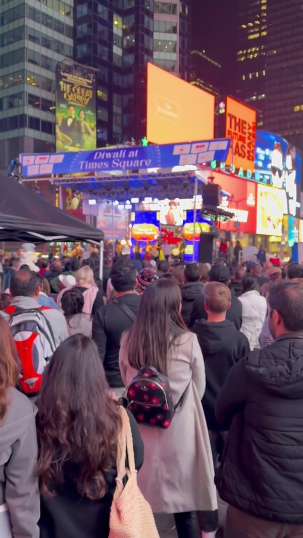 Crowds under the lights of Times Square during Diwali at Times Square