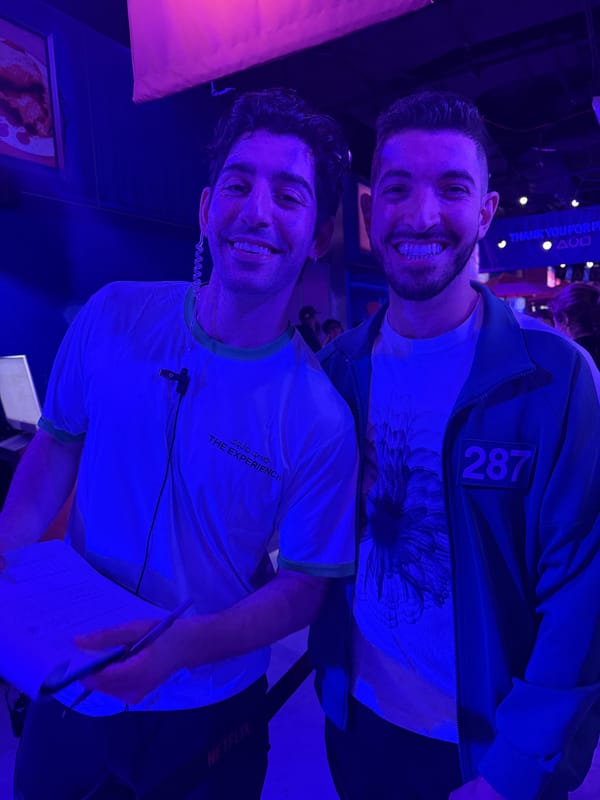 Rocky with a friend under blue light in the Night Market