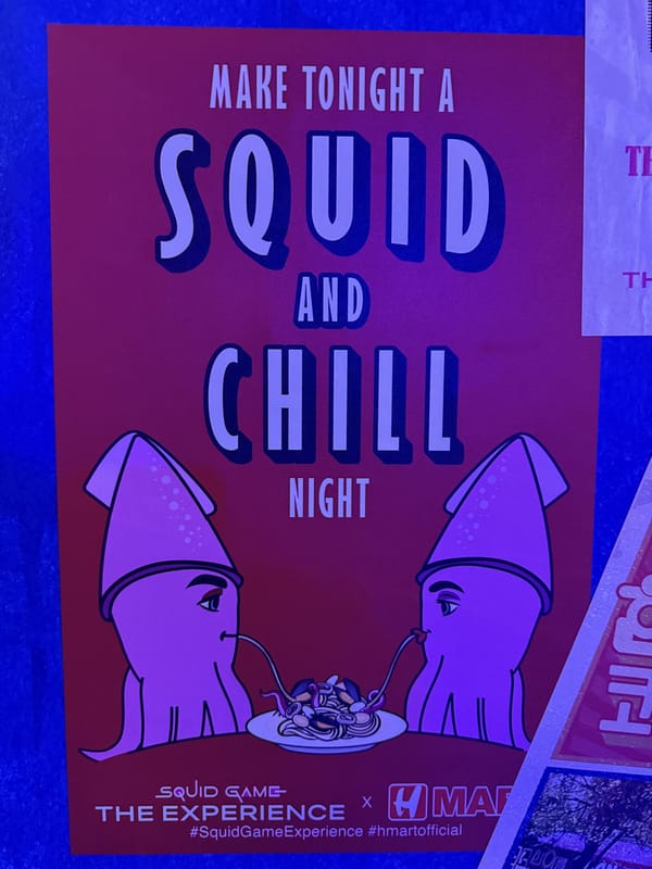 A red poster reading Make Tonight a Squid and Chill Night, a Squid Game: The Experience and H Mart collaboration