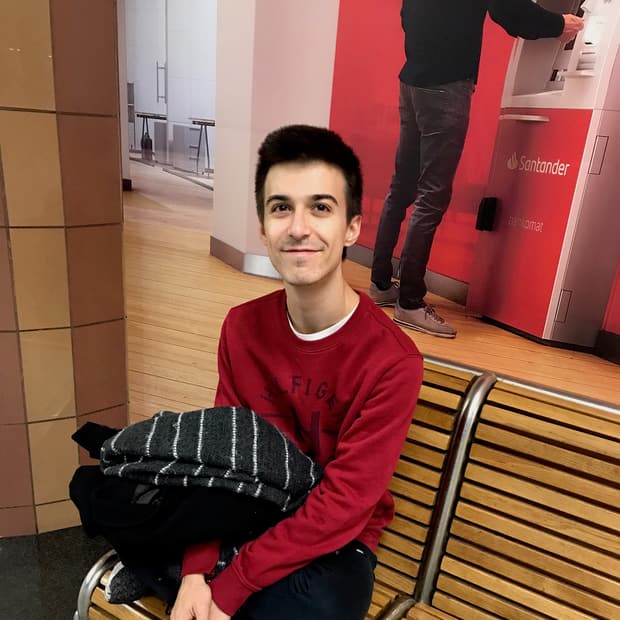 Rocky sitting on a bench in Warsaw
