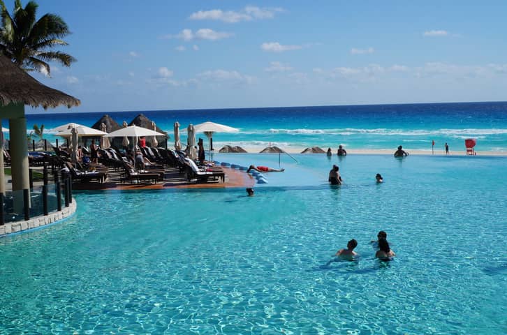 Enjoying This Resort’s Ocean-Blue Infinity Pool