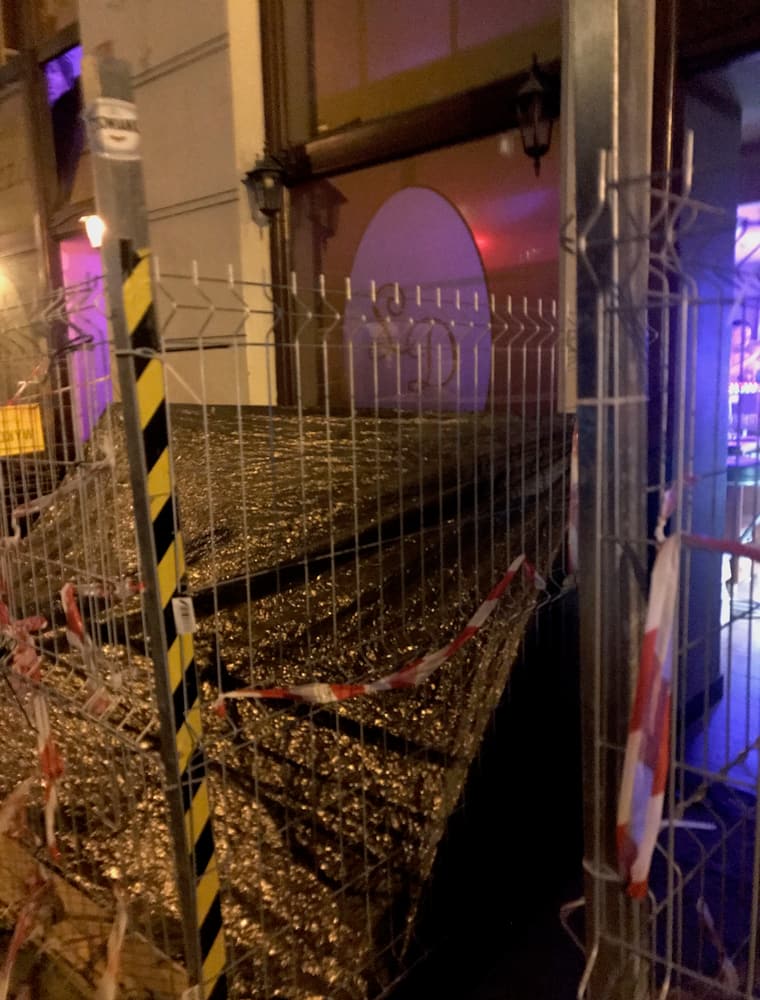 The entrance to the Lodi Dodi bar in Warsaw, wrapped in construction