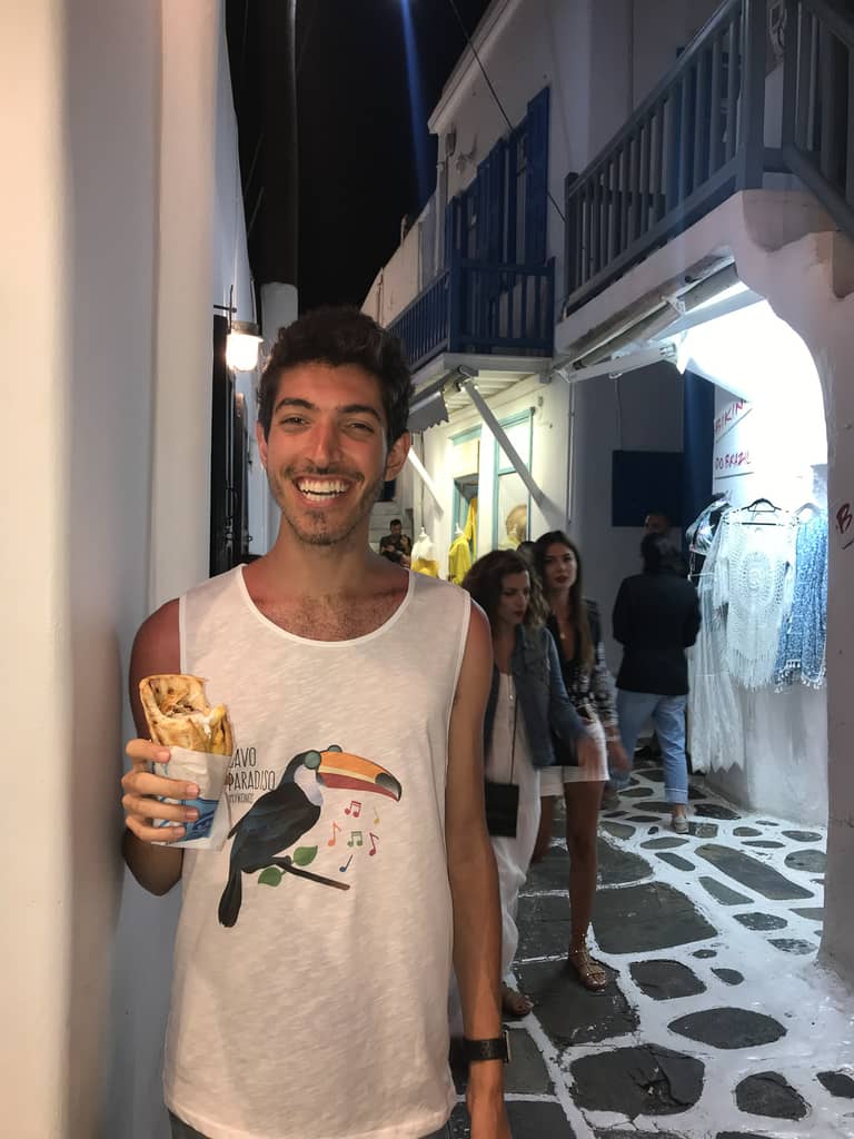 Rocky eating a gyro in Mykonos