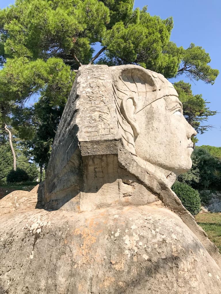 The nemes headdress of the Zadar sphinx, carved with symbols