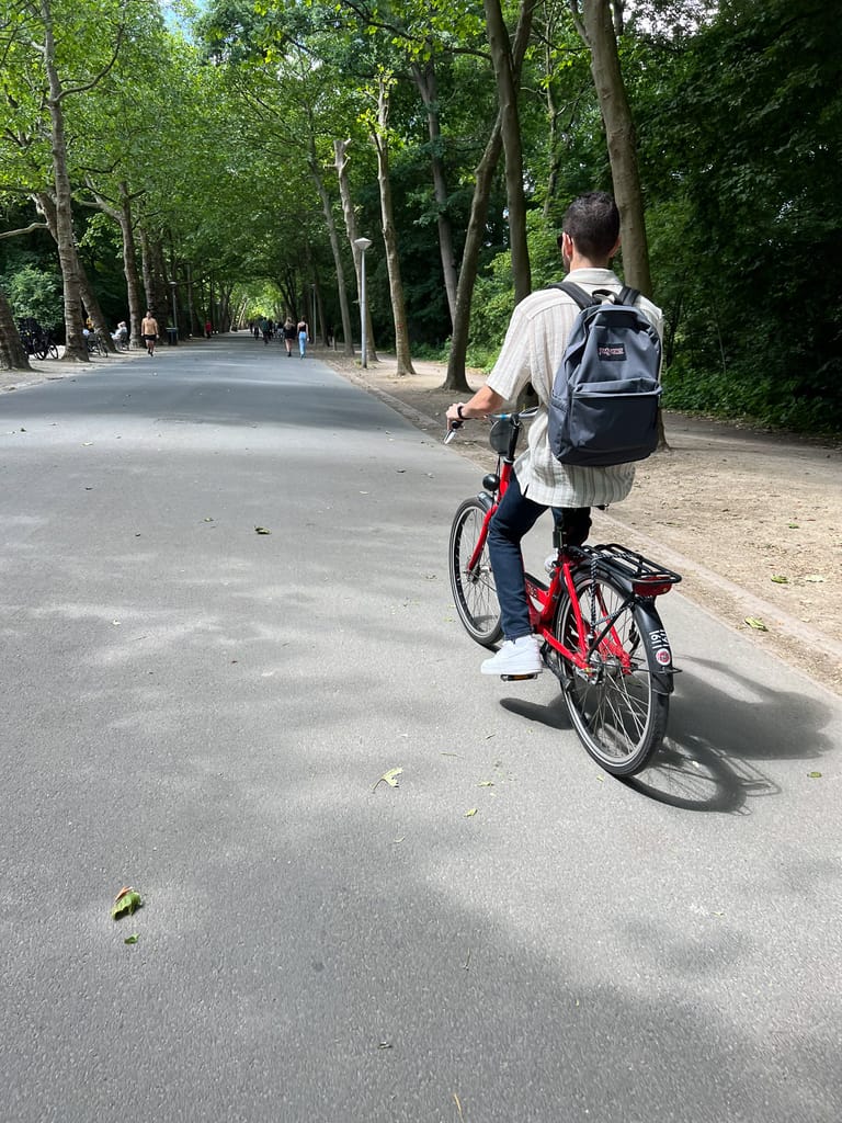 Rocky riding a bicycle in Vondelpark