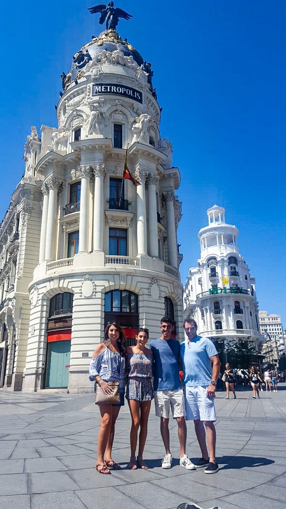 My family in Madrid, the Metropolis building behind
