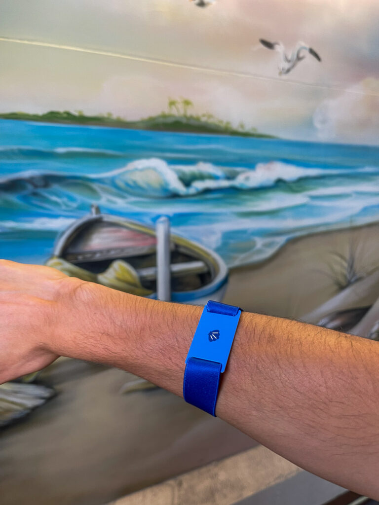 Wearing the room key wristband