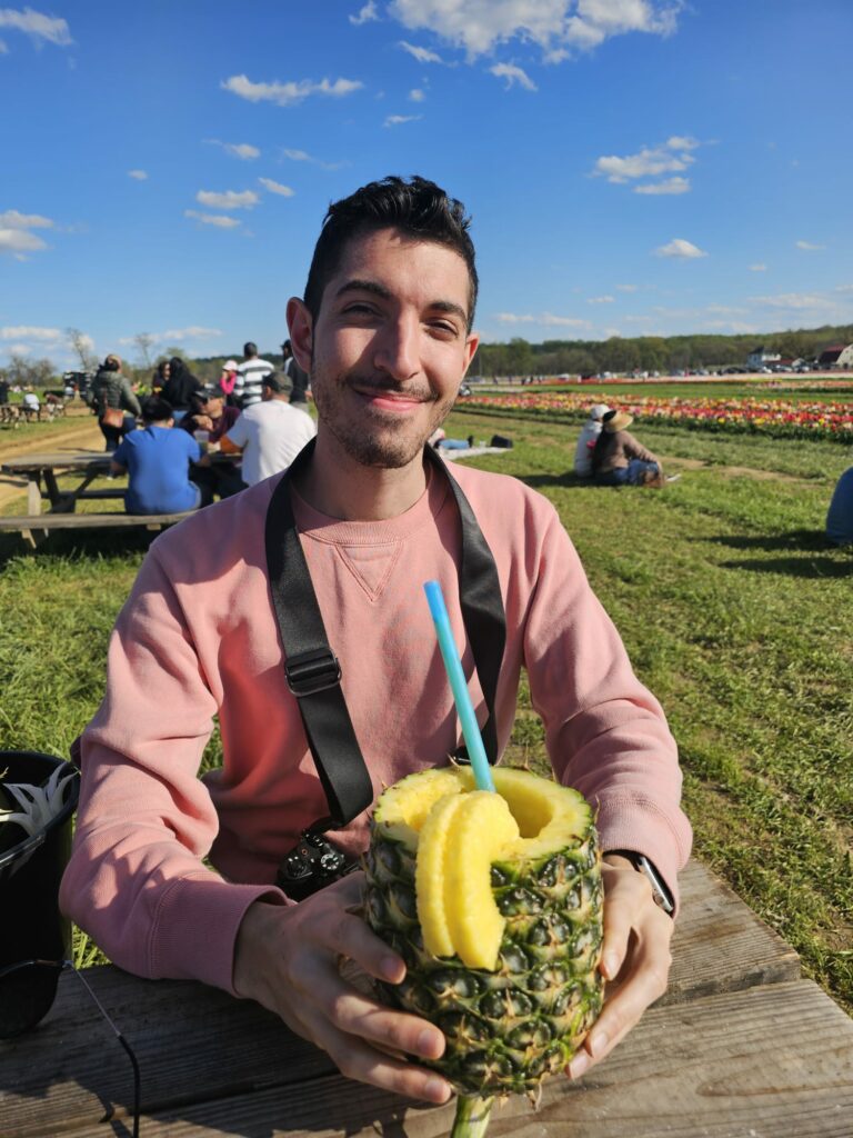 Food trucks at Holland Ridge Farm serve pineapple smoothies